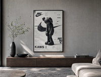 KAWS Companion figure standing poster framed above a wood console in a concrete-wall living room