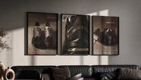 Nike running shoes triptych triptych in three black frames on a grey wall above a leather sofa
