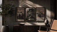 Nike running shoes triptych triptych in three walnut frames above a sideboard in a warm room
