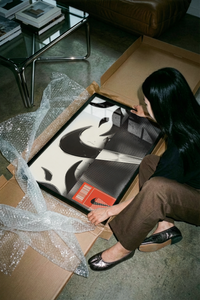 The Nike swoosh logo athletic shoe design poster shown across its range of print sizes