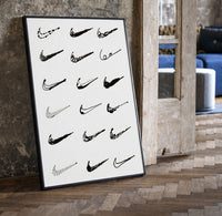 Various hand-drawn Nike swoosh logos print in a black frame leaning beside a vintage door on parquet