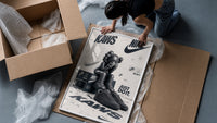 KAWS Companion figure and sneaker framed print being unpacked from protective bubble wrap and a box
