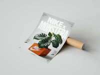 Rolled Monstera plant in Nike shoe box poster beside its crush-resistant kraft shipping tube