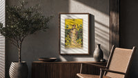 Woman with falcon in vineyard poster framed above a fluted sideboard beside an olive tree