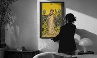 Nine of Pentacles print in a slim black frame being hung on a sunlit wall in a monochrome room