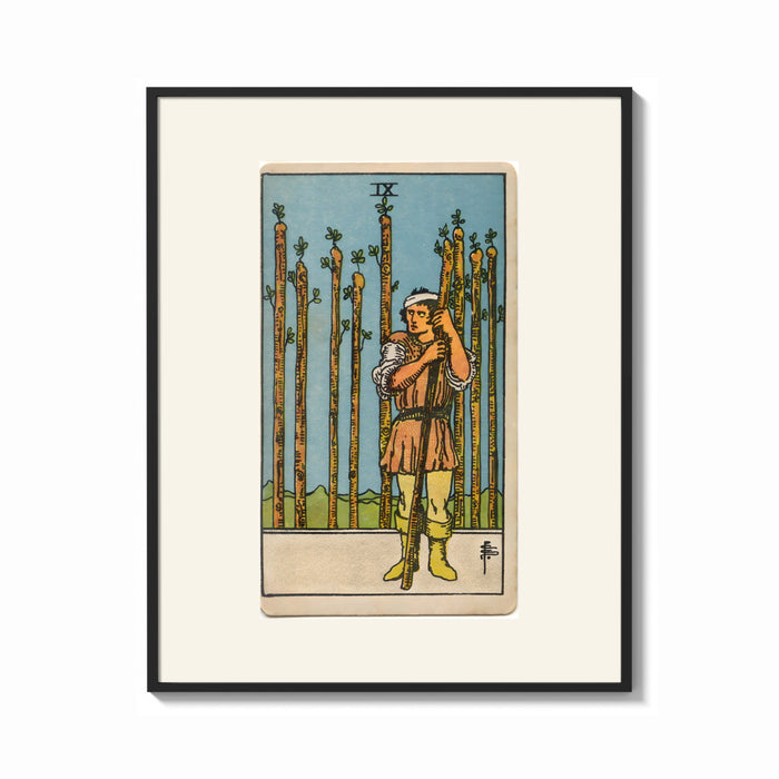 Framed Man holding wooden staff among wands print shown as a bold statement piece on a clean gallery wall