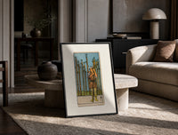 Man holding wooden staff among wands print in a black frame leaning on a travertine table in a sunlit lounge
