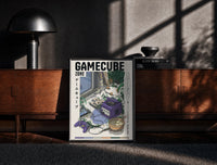 Black-framed Purple GameCube console with controller print on a moody console with designer coffee-table books