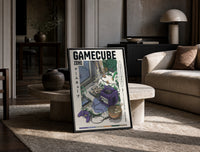 Purple GameCube console with controller print in a black frame leaning on a travertine table in a sunlit lounge