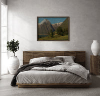 Norwegian fjord mountain landscape with cabin print in a dark wood frame above a rattan bed on a plaster wall