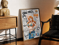 Brass-framed Nami from One Piece anime print leaning in a warm styled corner by a sculpture