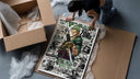 Roronoa Zoro wielding katana sword framed print being unpacked from protective bubble wrap and a box