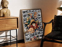 Brass-framed One Piece Straw Hat Crew characters print leaning in a warm styled corner by a sculpture
