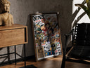 Walnut-framed One Piece Straw Hat Crew characters print leaning against a sunlit rustic brick wall