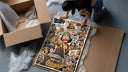 Usopp sniper character collage framed print being unpacked from protective bubble wrap and a box