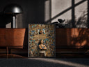 Black-framed Usopp with wanted posters print on a moody console with designer coffee-table books