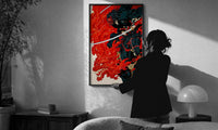 Demon-masked samurai riding black horse print in a slim black frame being hung on a sunlit wall in a monochrome room