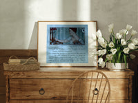 Elegant woman holding hand mirror print in an oak frame on a farmhouse dresser beside white tulips
