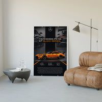 Orange Mercedes-AMG GT Black Series poster framed above a tan leather living-room couch