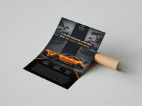 Orange Mercedes-AMG GT Black Series poster print laid beside its crush-resistant shipping tube