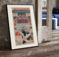 Orient Express railway travel poster print in a black frame leaning beside a vintage door on parquet