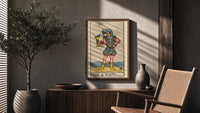 Page of Cups poster framed above a fluted sideboard beside a potted tree