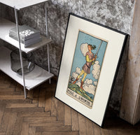 Young figure holding upraised sword poster in a black frame leaning beside a shelf in a raw-plaster loft