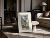 Young figure holding upraised sword print in a black frame leaning on a travertine table in a sunlit lounge
