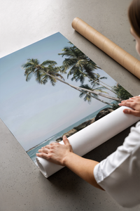 Palm trees on tropical beach print laid flat in a styling flatlay