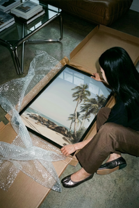 The Palm trees on tropical beach poster shown across its range of print sizes