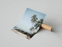 Palm trees on tropical beach poster styled above furniture in a modern room