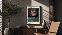 Grinning woman's face with earring poster framed above a fluted sideboard beside an olive tree
