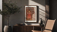 Young girl in red nightgown poster framed above a fluted sideboard beside an olive tree