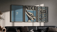Patta x Nike Air Max 1 Blue Triptych in black frames on a grey wall above a leather sofa