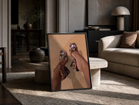 Cowhide Mules and Chain Anklet print on the floor, leaning against a travertine table