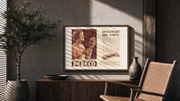 Woman holding hand mirror print in a wood frame above a fluted sideboard beside an olive tree