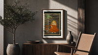 Girl in red dress eating biscuit poster framed above a fluted sideboard beside an olive tree