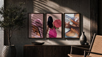 Pink Headscarf, Roses and Drink Set of 3 in walnut frames above a sideboard in a warm room