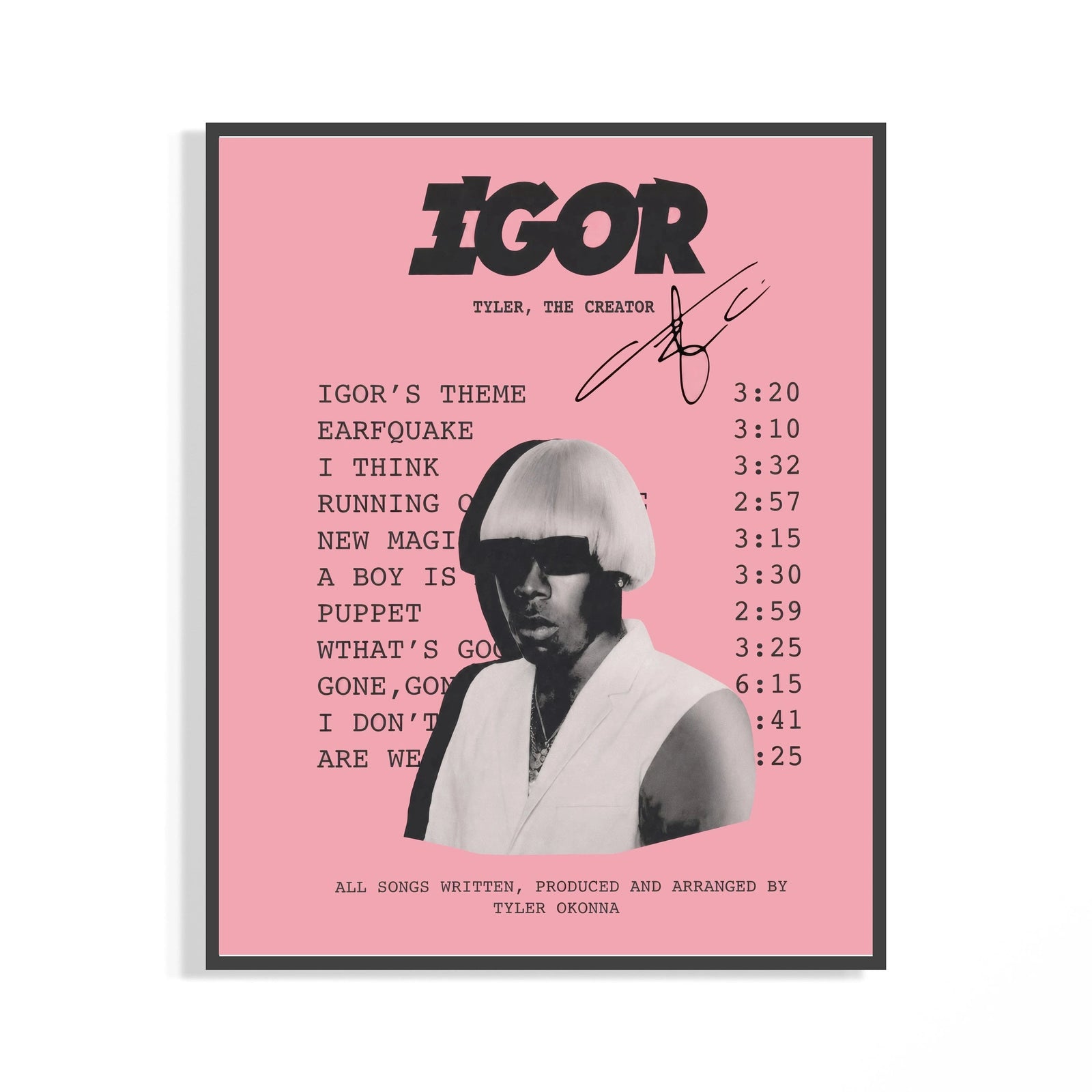 Framed Pink Tyler the Creator IGOR Tracklist print shown as a statement piece on a gallery wall