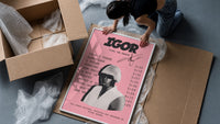 Pink Tyler the Creator IGOR Tracklist framed print being unboxed from protective packaging