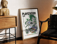 Brass-framed Overgrown PlayStation console with controller print leaning in a warm styled corner by a sculpture