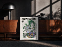 Black-framed Overgrown PlayStation console with controller print on a moody console with designer coffee-table books