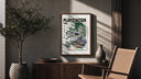 Overgrown PlayStation console with controller poster framed above a fluted sideboard beside an olive tree
