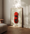 Porsche 911 Carrera RS 1995 minimalist red car wall art leaning against wall in modern living room
