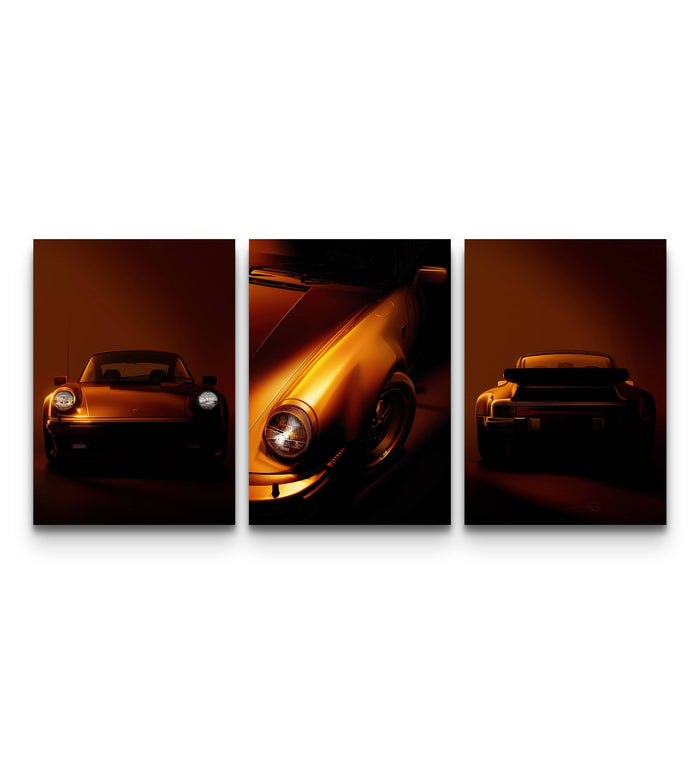 Three Porsche 911 prints showing front, side, and rear angles in dramatic orange tones on a white wall