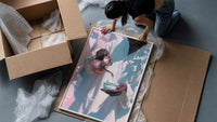Pouring Tea in a White Robe framed print being unpacked from protective bubble wrap and a box
