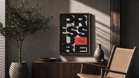 Pressure Is a Privilege poster framed above a fluted sideboard beside a potted tree