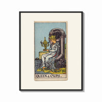 Framed Queen seated on throne holding cup print shown as a bold statement piece on a clean gallery wall