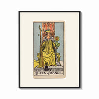 Framed Queen of Wands tarot card print shown as a bold statement piece on a clean gallery wall