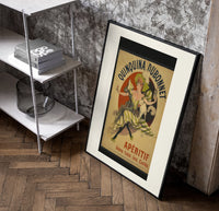 Woman dancing with white cat poster in a black frame leaning beside a shelf in a raw-plaster loft